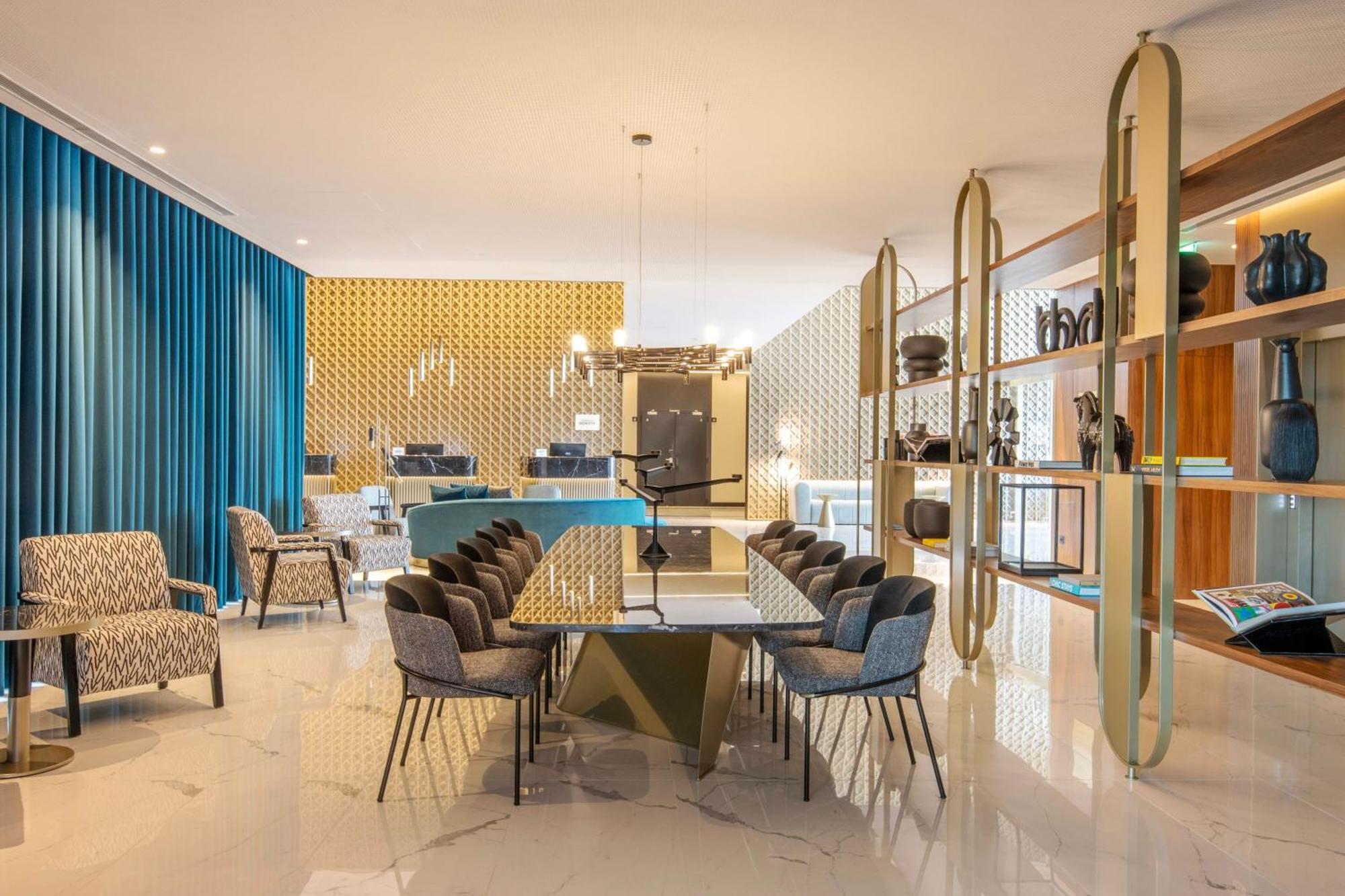 Renaissance Porto Lapa Hotel Luaran gambar The interior of a typical apartment