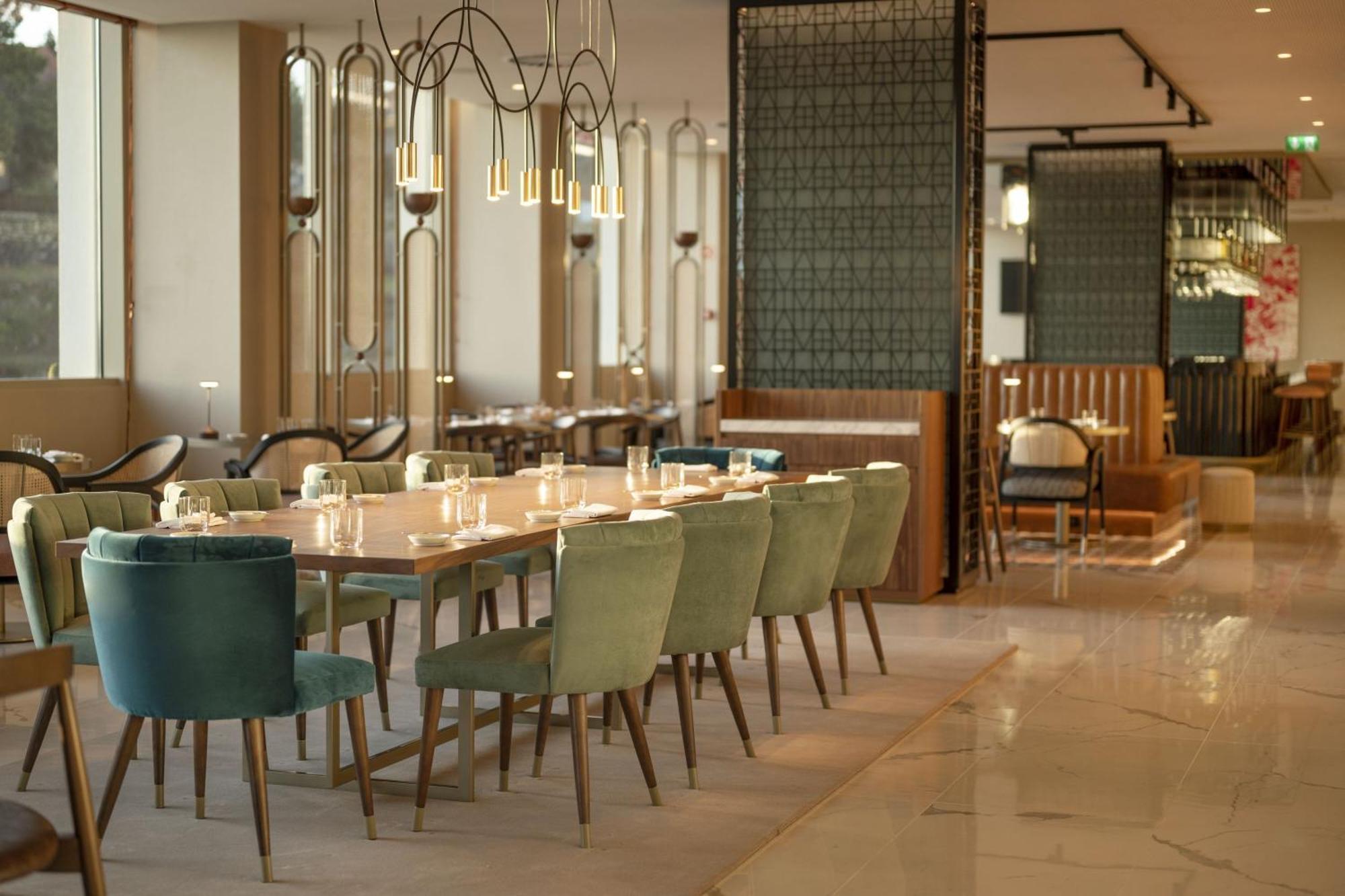 Renaissance Porto Lapa Hotel Luaran gambar The restaurant